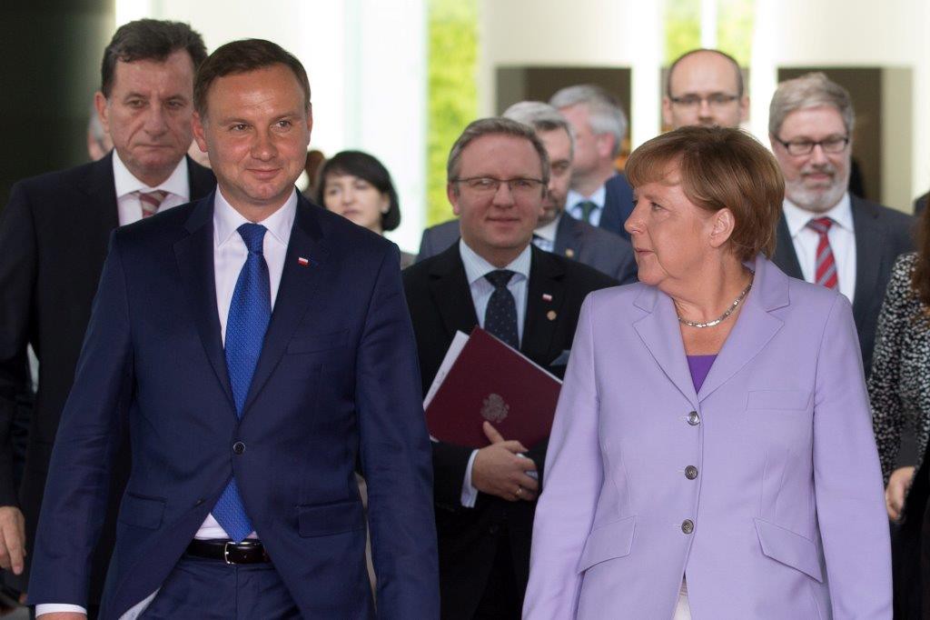 Andrzej Duda i Angela Merkel i Krzysztof Szczerski